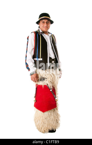 Happy Latino man from South America highland dressed in Folklore clothes with Llama fur from Ecuador, Peru or Bolivia, isolated. Stock Photo