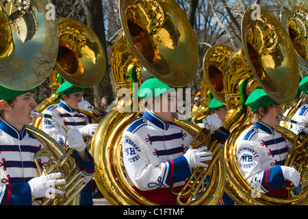 Tuba players in the Londenderry, NH High School marching band in the 2011 St. Patrick's Day parade in New York City Stock Photo