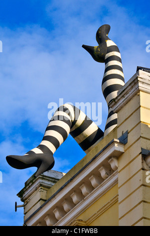 Giant 'Can Can' legs sculpture on the roof of Duke of Yorks art house cinema, Brighton, East Sussex, UK Stock Photo