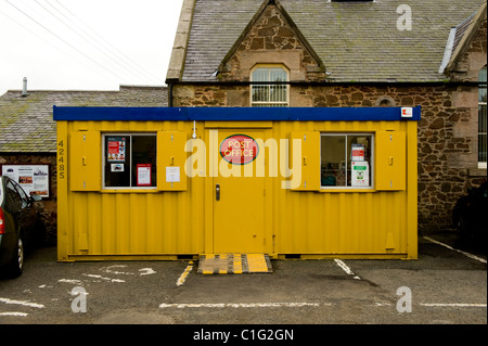 Post Office in Yellow Portable Container Building, Coldingham, Scotland Stock Photo