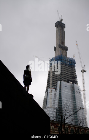A statue in More London Place in front of  The Shard, London. Stock Photo