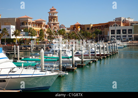 CABO SAN LUCAS, MEXICO - FEBRUARY 11: A busy downtown shopping mall and marina in Cabo San Lucas, Mexico on February 11, 2011. Stock Photo