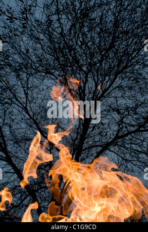 Memorial fire flame in Auschwitz concentration camp Poland Stock Photo