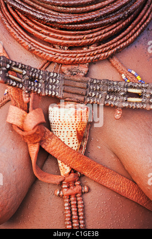 Jewelery worn by Himba woman in traditional dress who live in the Kunene Region, Namibia Stock Photo