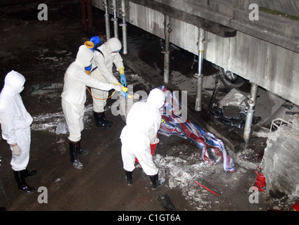 Viaduct collapse in China Rescuers investigate the rubble after a viaduct collapse in Zhuzhou City, China. Six people died and Stock Photo