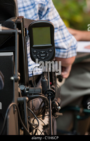 Digital readout for a breathing ventilator on a motorized wheelchair for a man with Duchenne muscular dystrophy Stock Photo