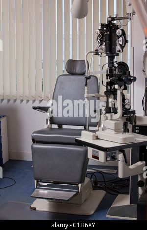 Examining chair and eye test equipment in a doctor's office Stock Photo