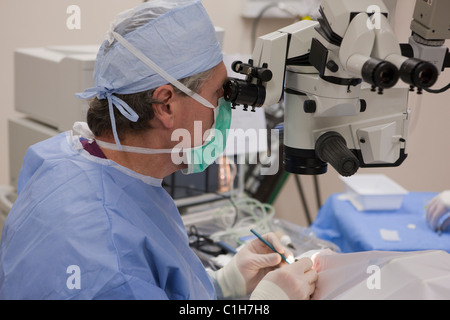 Ophthalmologist performing cataract surgery Stock Photo