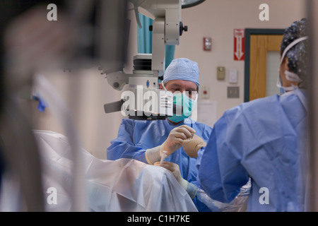 Ophthalmologist performing cataract surgery Stock Photo