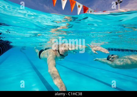 Male competitors in the collegiate Orange Bowl Swimming Classic in training prior to event. Stock Photo