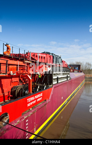 Unloading Alstom National Grid Electrical Transformer, Preston from the barge Terra Marique on the River Ribble, Lancashire, UK Stock Photo