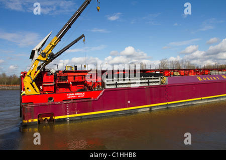 Unloading Alstom National Grid Electrical Transformer, transport of heavy loads from the barge Terra Marique on the River Ribble, Preston, UK Stock Photo