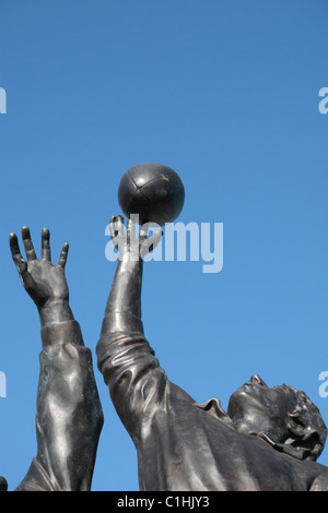 Detail of the bronze sculpture by Gerald Laing, depicting a rugby line-out, outside Twickenham Rugby Stadium, London, UK. Stock Photo