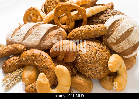 Various types of brown bread and rolls Stock Photo