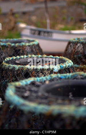 Lobster pots on the slipway at Penberth Cove on the Cornish coast UK Stock Photo