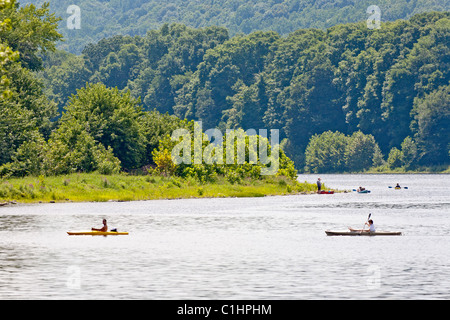 Boaters on a river. Stock Photo