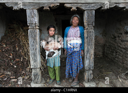 Nepali woman with kid in the Himalaya Nepal Stock Photo