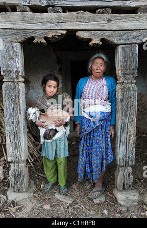 Nepali woman with kids in the Himalaya Nepal Stock Photo