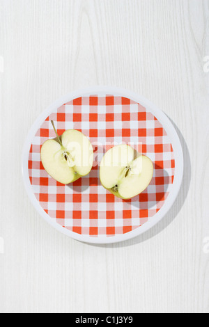 Apple Halves on Plate Stock Photo