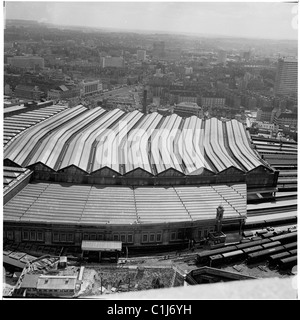 1960s, view from above of the distinctive curved train sheds roofs of St Pancras train station, Camden, London, built by Midland Railway in 1868. Stock Photo