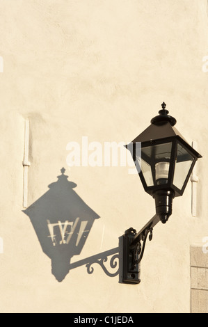 Quebec City, Quebec, Canada. Lantern on wall of Vieux Seminaire de Quebec (Seminary of Quebec). Stock Photo