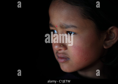 Nepali girl in the hills of Nepal Stock Photo - Alamy