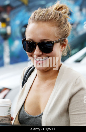 Hayden Panettiere returns to her car surrounded by paparazzi photographers after visiting a positive ion therapy clinic. West Stock Photo