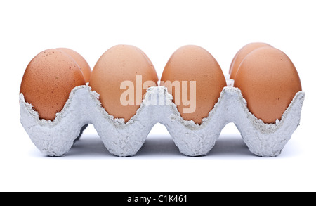 Eggs in container isolated on white Stock Photo