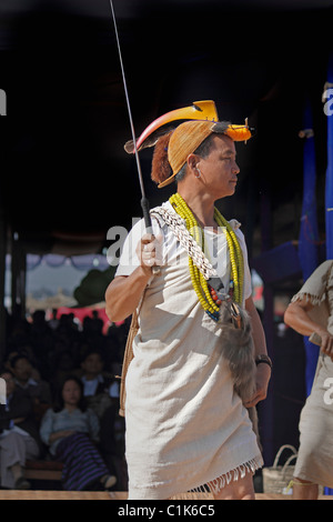 Nyishi tribe, man with traditional hair knot and a Dao in hand at Namdapha Eco Cultural Festival; Miao; Arunachal Pradesh; India Stock Photo