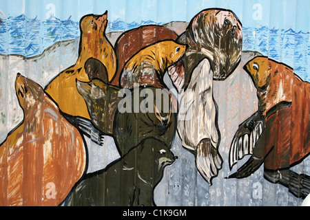 Mural Of Cape Fur Seals Lounging On Rocks Painted On A Shipping Container In Hout Bay, South Africa Stock Photo