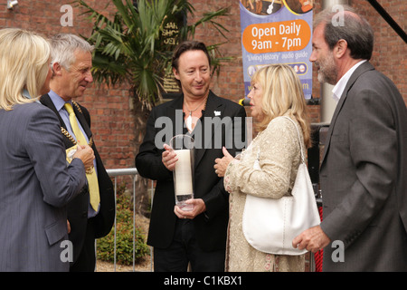 The Lord Mayor of Liverpool, Councillor Mike Storey, Julian Lennon and Cynthia Lennon attend the opening of 'White Feather: The Stock Photo