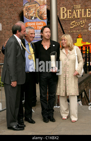 The Lord Mayor of Liverpool, Councillor Mike Storey, Julian Lennon and Cynthia Lennon attend the opening of 'White Feather: The Stock Photo