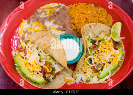 Tacos dinner with rice and re fried beans Stock Photo