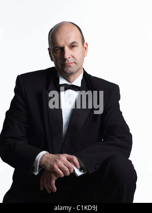 Portrait of Man in Tuxedo Stock Photo