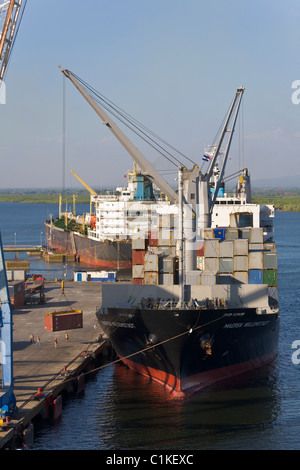 Container ship being unloaded, Port of Corinto, Nicaragua Stock Photo