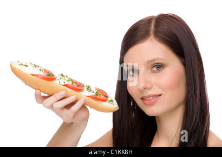 Healthy lifestyle - happy woman enjoy caprese sandwich Stock Photo