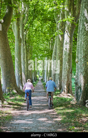 Couple Riding Bicycles, France Stock Photo
