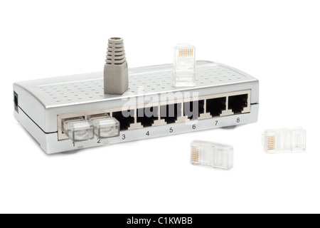 Eight port switch and connecters insulated on white background Stock Photo