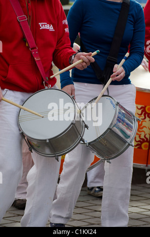 The Edinburgh Samba School drum band performing in the centre of Edinburgh, Scotland. Stock Photo