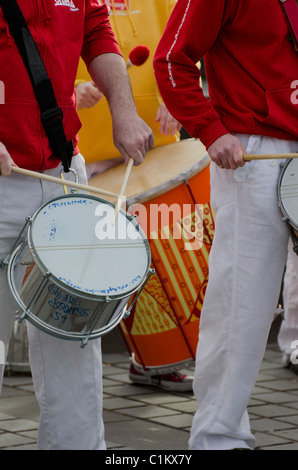 The Edinburgh Samba School drum band performing in the centre of Edinburgh, Scotland. Stock Photo