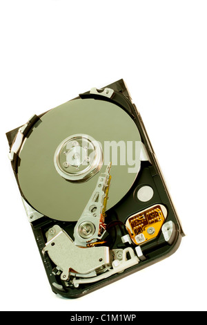 close view detail of the inside of a computer harddisk isolated on a white background. Stock Photo