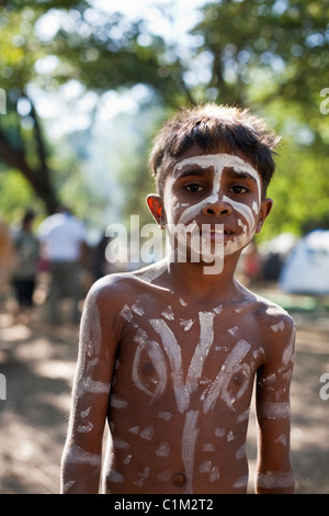 Aboriginal child with face paint blue yellow 1447 Stock Photo - Alamy