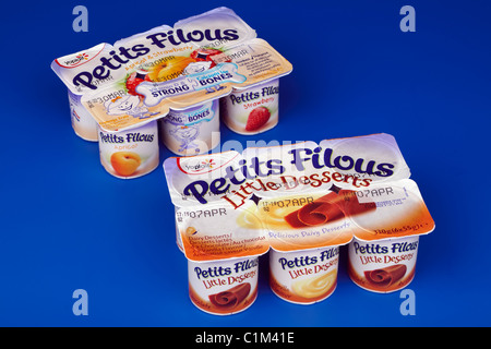 Two Packets of four different flavoured pots of Petits Filous little dairy desserts Stock Photo