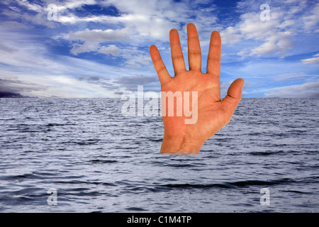 Hand of a drowning man reaching for help. Stock Photo