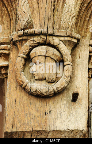 France, Cher, Sologne, Aubigny sur Nere, wood medallion on the frontage of the Bailli House Stock Photo