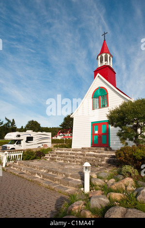 Motorhome camper at the Historic Indians chapel in Tadoussac, Quebec, Canada. Stock Photo