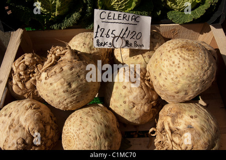Celeriac root vegetable on sale in a greengrocers shop UK Stock Photo