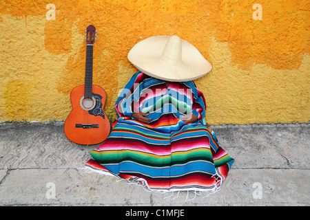 Mexican typical lazy man sombrero hat guitar serape nap siesta Stock Photo