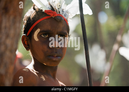 Aboriginal child with face paint blue yellow 1447 Stock Photo - Alamy