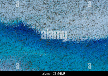 A blue and white wave of a background. Stock Photo